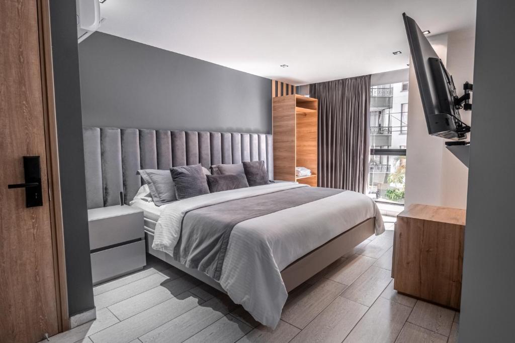 Postel nebo postele na pokoji v ubytování Hotel Plaza Doce