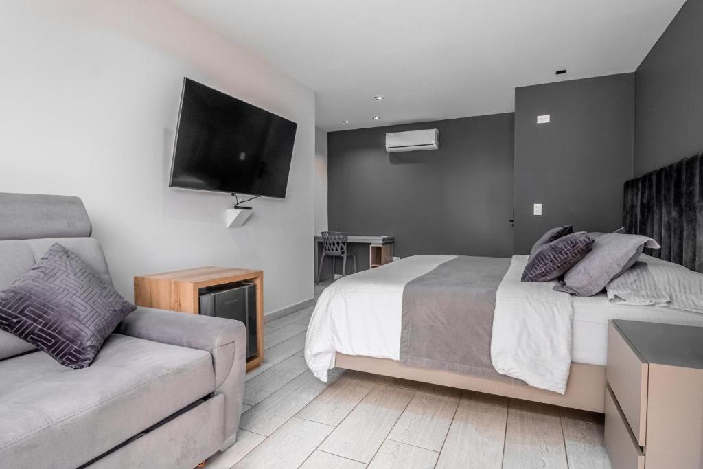 Postel nebo postele na pokoji v ubytování Hotel Plaza Doce