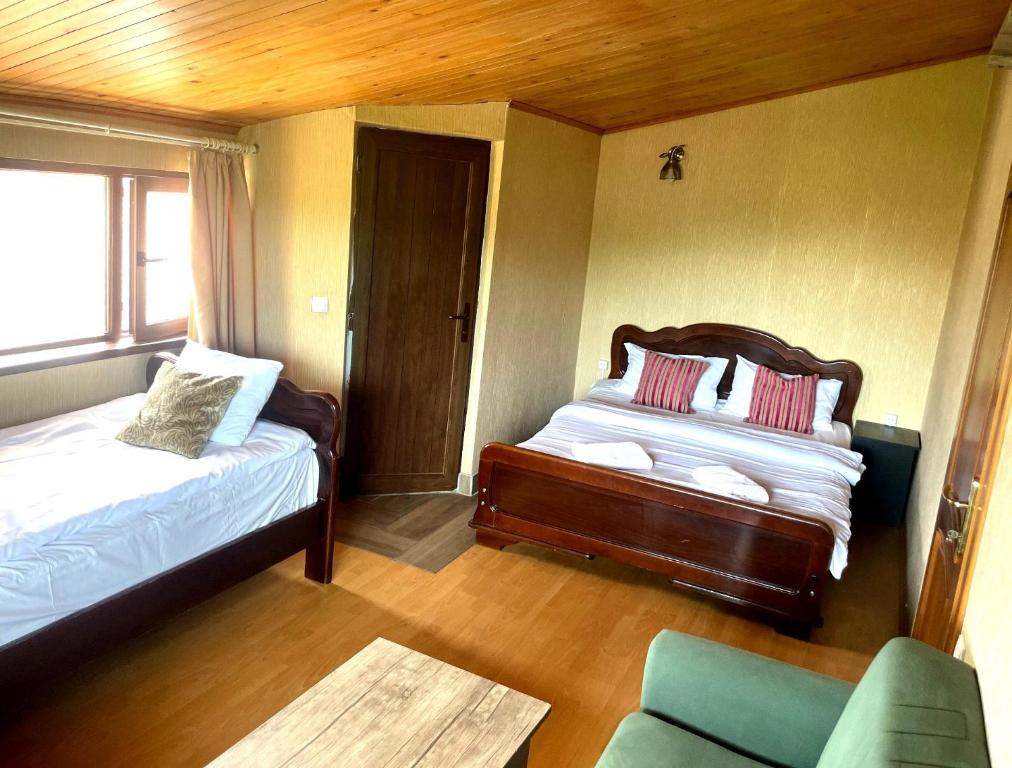 Postel nebo postele na pokoji v ubytování Hotel Prime