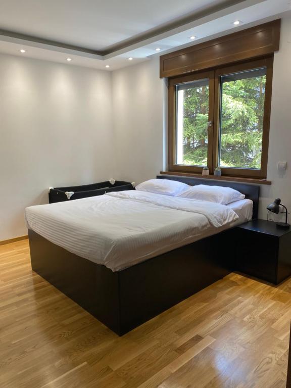 Krevet ili kreveti u jedinici u okviru objekta Zlatibor Apartman