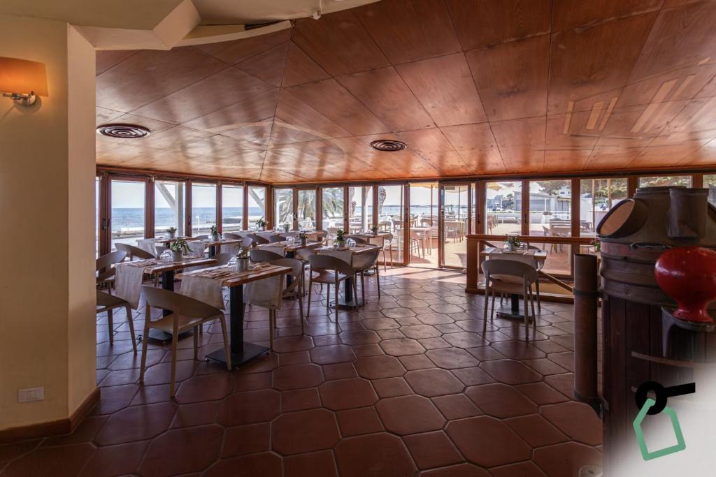 Restaurace v ubytování HOTIDAY Room Collection - Circeo