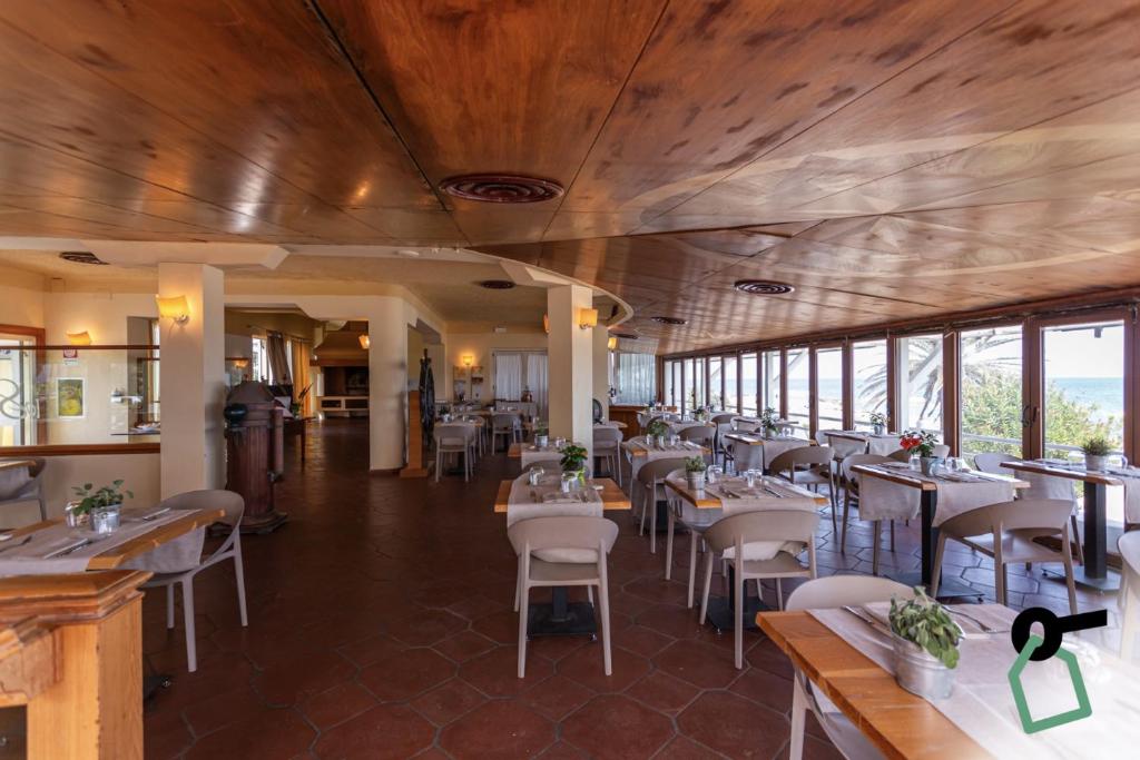 Restaurace v ubytování HOTIDAY Room Collection - Circeo