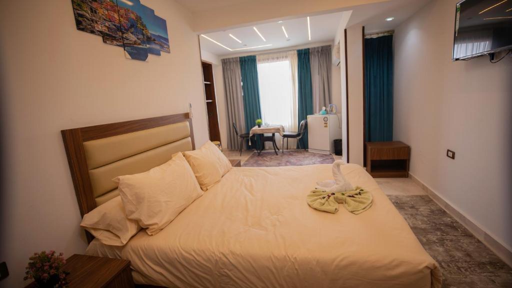 Postel nebo postele na pokoji v ubytování Giza pyramids hotel