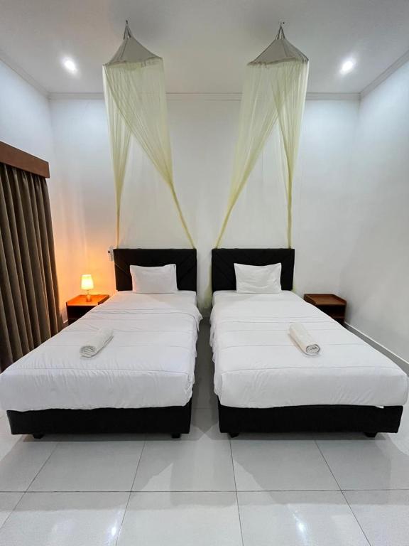 Cama o camas de una habitación en parida bungalow