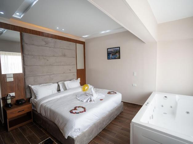 Postel nebo postele na pokoji v ubytování Tuya pyramids hotel