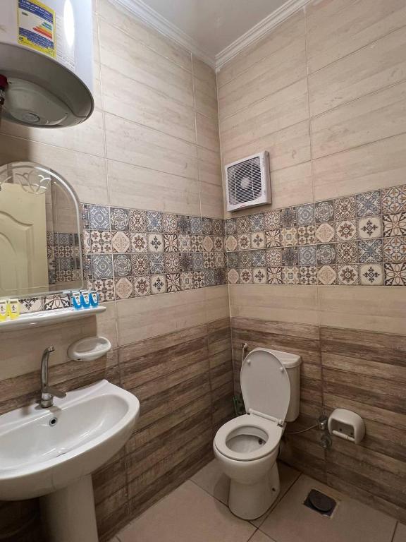Koupelna v ubytování Beko pyramids inn
