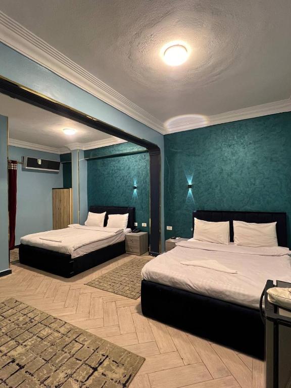 Postel nebo postele na pokoji v ubytování Beko pyramids inn