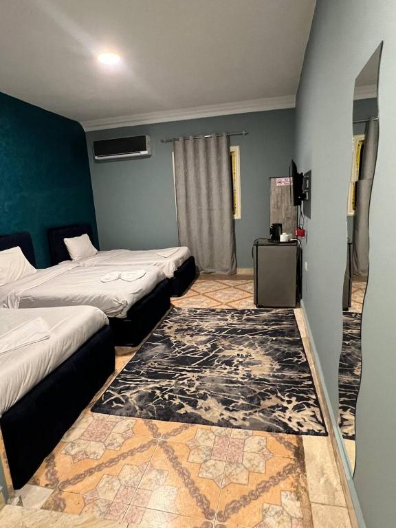 Postel nebo postele na pokoji v ubytování Beko pyramids inn