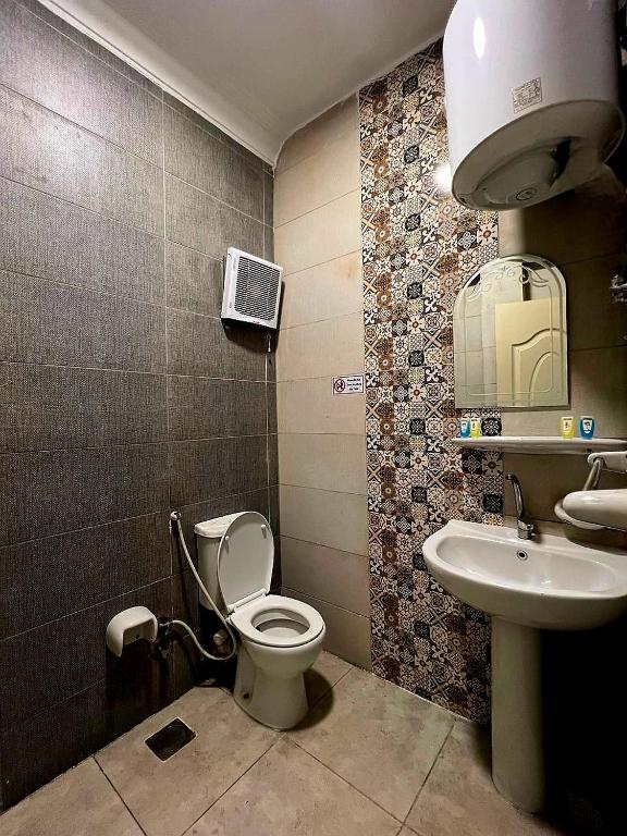 Koupelna v ubytování Beko pyramids inn