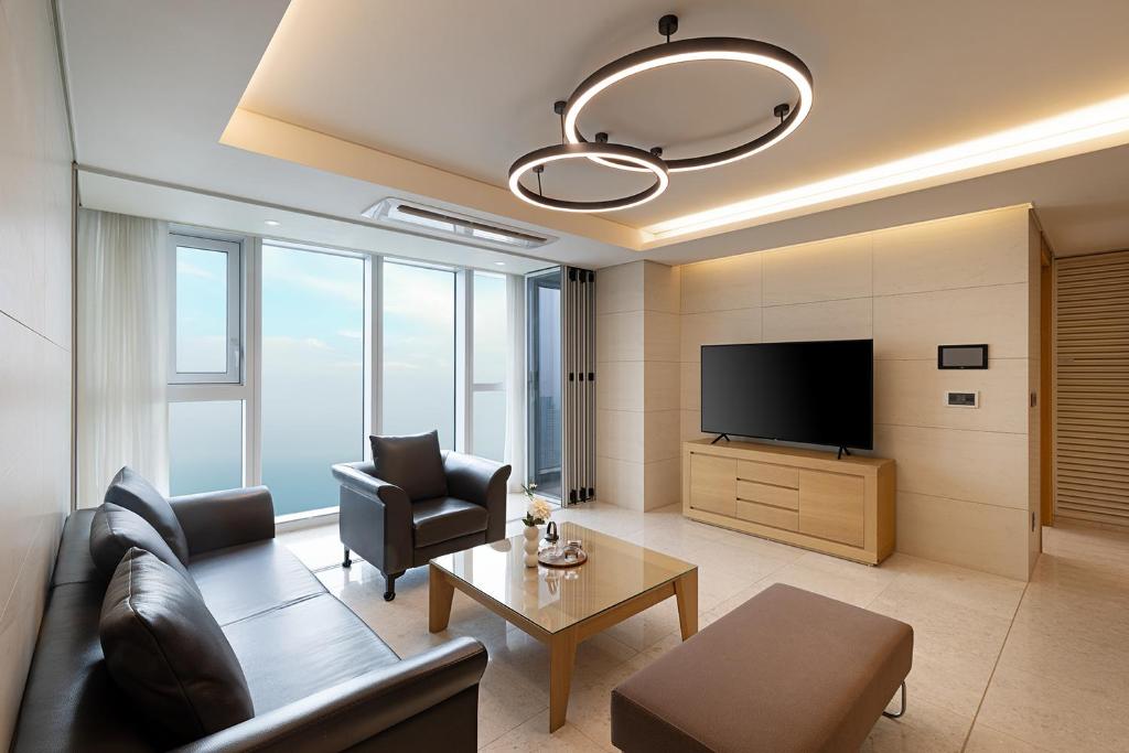 TV a/nebo společenská místnost v ubytování LCT Residence The Vine Haeundae