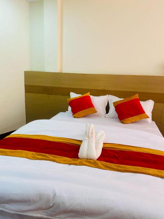 Postel nebo postele na pokoji v ubytování Hotel Nur