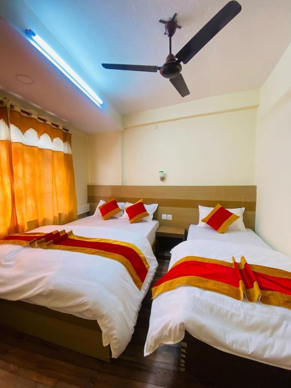 Postel nebo postele na pokoji v ubytování Hotel Nur