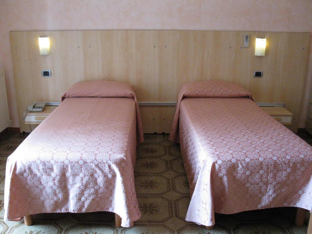 Postel nebo postele na pokoji v ubytování La Collina