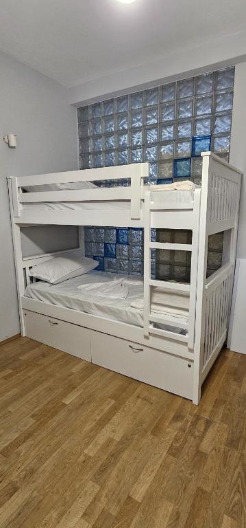 Postel nebo postele na pokoji v ubytování i hostel