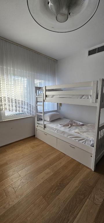 Postel nebo postele na pokoji v ubytování i hostel