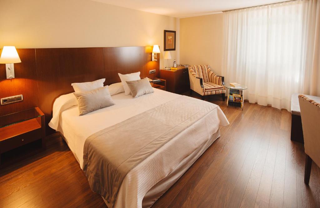 Posteľ alebo postele v izbe v ubytovaní Hospedium Hotel Mirador de Gredos
