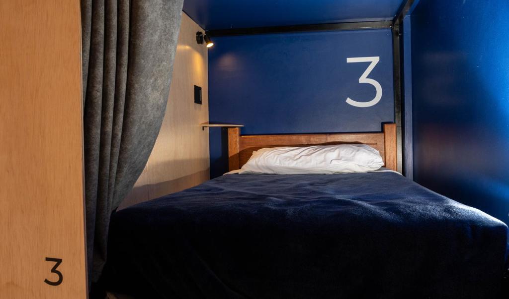 Postel nebo postele na pokoji v ubytování Community Hostel Quito