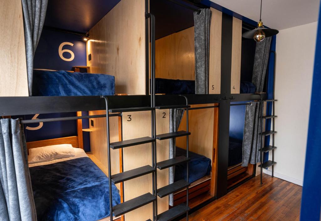 Postel nebo postele na pokoji v ubytování Community Hostel Quito