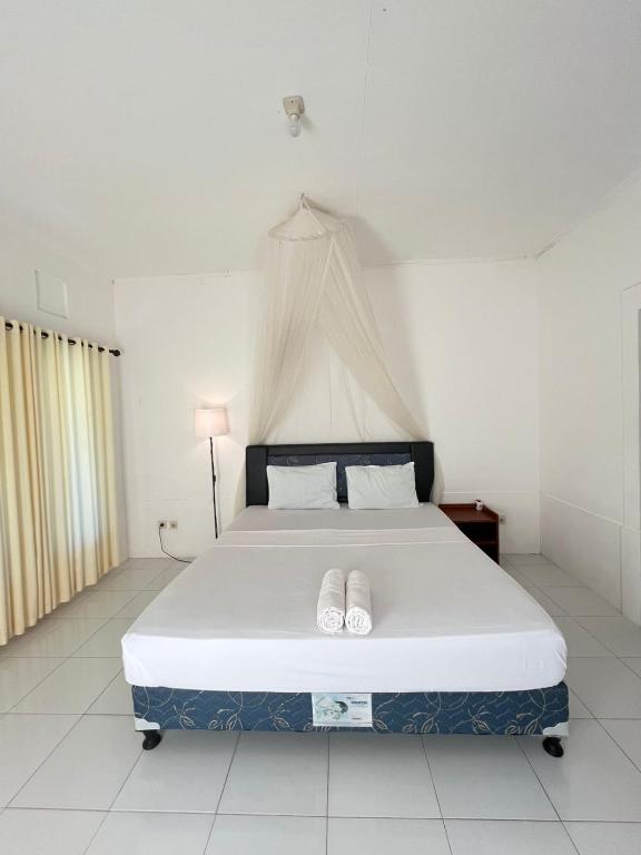 Cama o camas de una habitación en parida bungalow