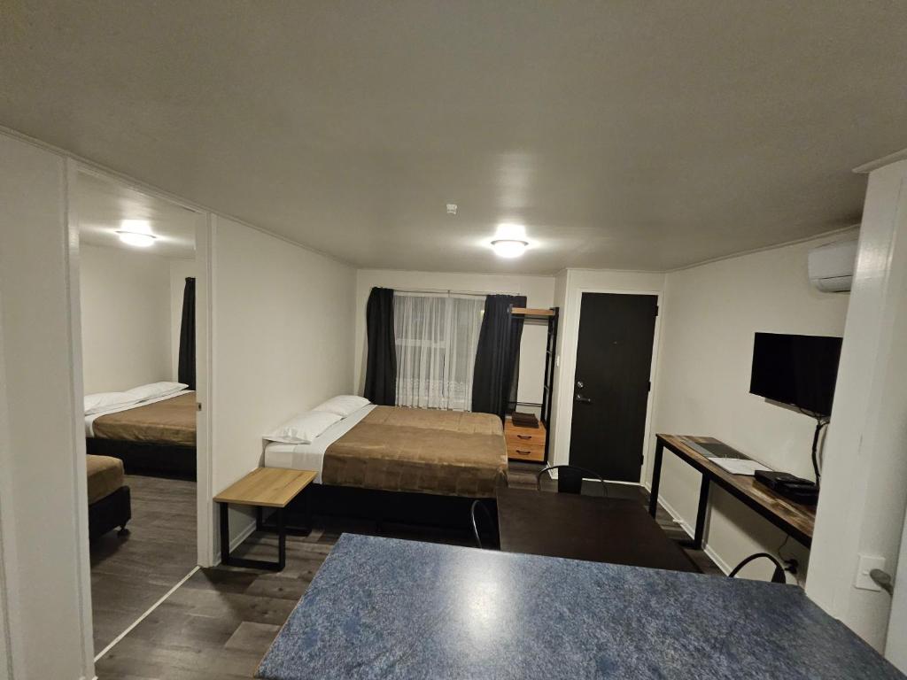 Postel nebo postele na pokoji v ubytování Rockfield Motel