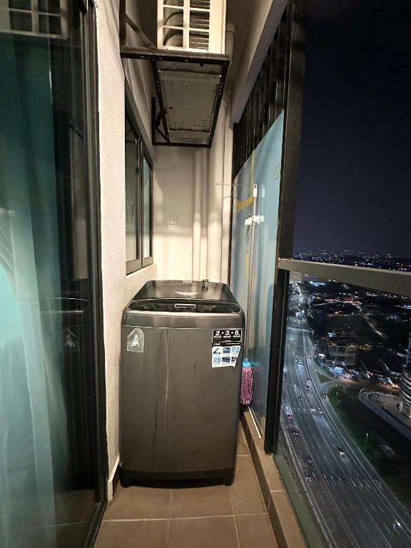 Fotografie z fotogalerie ubytování Symphony Tower - Studio, High Floor, Self Check in, Free Parking, Free Netflix, 200mbps WIFI WIFI v destinaci Seri Kembangan