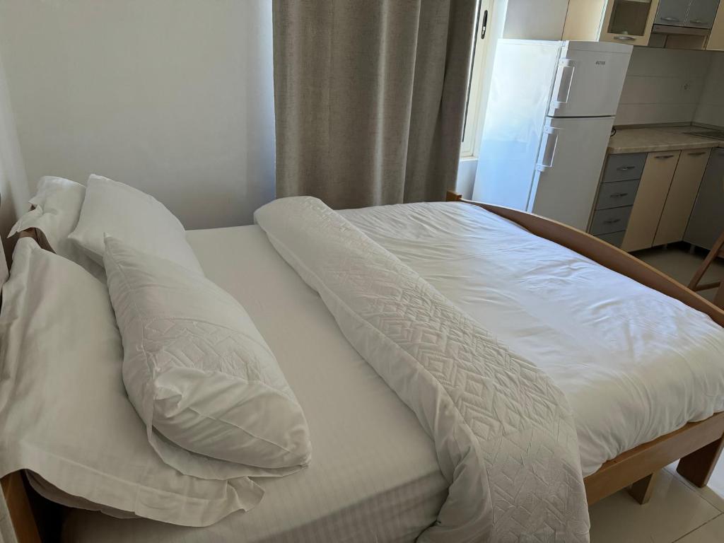 Postel nebo postele na pokoji v ubytování KuneVain Guest House