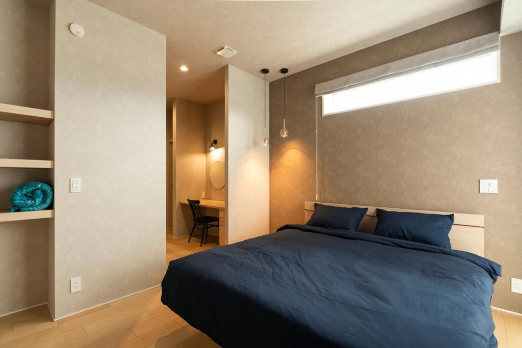 Postel nebo postele na pokoji v ubytování -Mova Villa Koshi Daiwa 4-近阿蘇 熊本城 各類溫泉 台積電 合志獨棟民宿 體驗當地生活