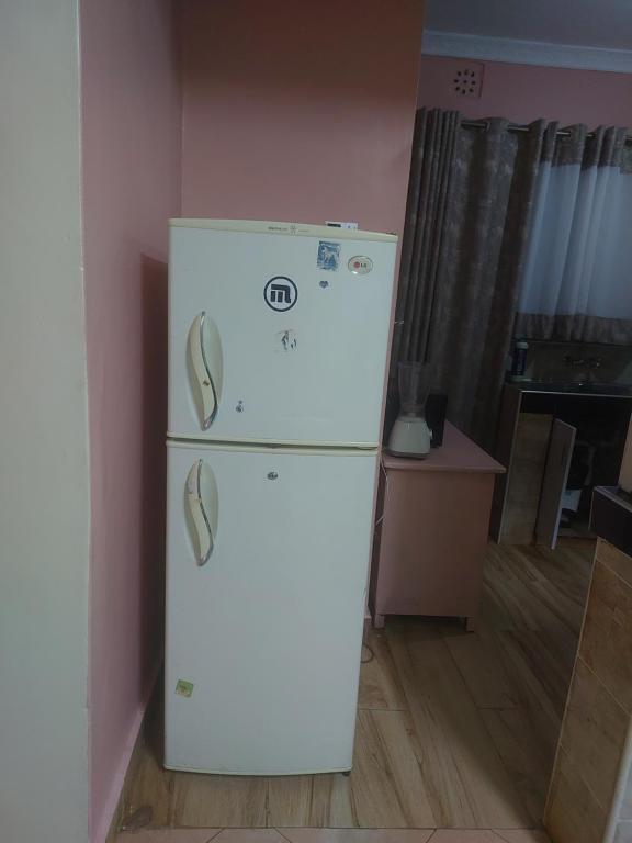 Kuchyň nebo kuchyňský kout v ubytování Kukis Place in Embu
