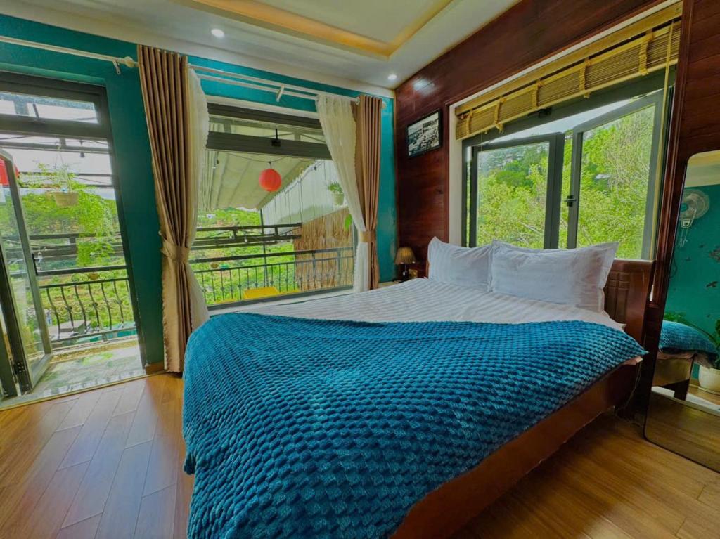 Postel nebo postele na pokoji v ubytování Pine Forest House Dalat