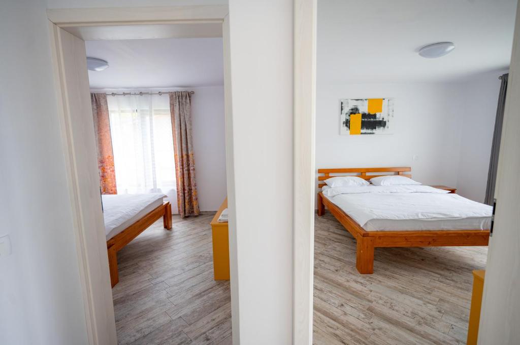 Postel nebo postele na pokoji v ubytování ViiLa TO