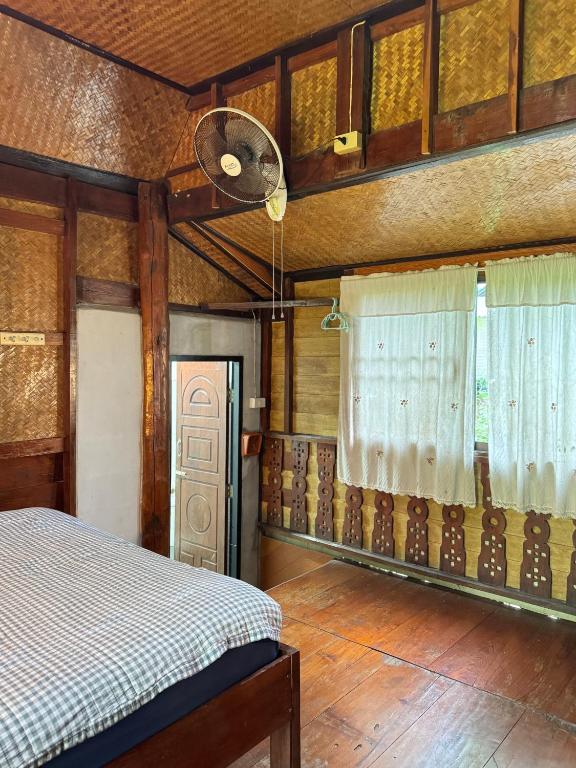 Postel nebo postele na pokoji v ubytování Shaya Homestay & Dorms