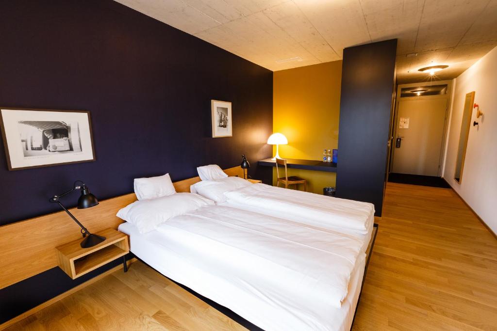 Postel nebo postele na pokoji v ubytování Hotel ZwiBack