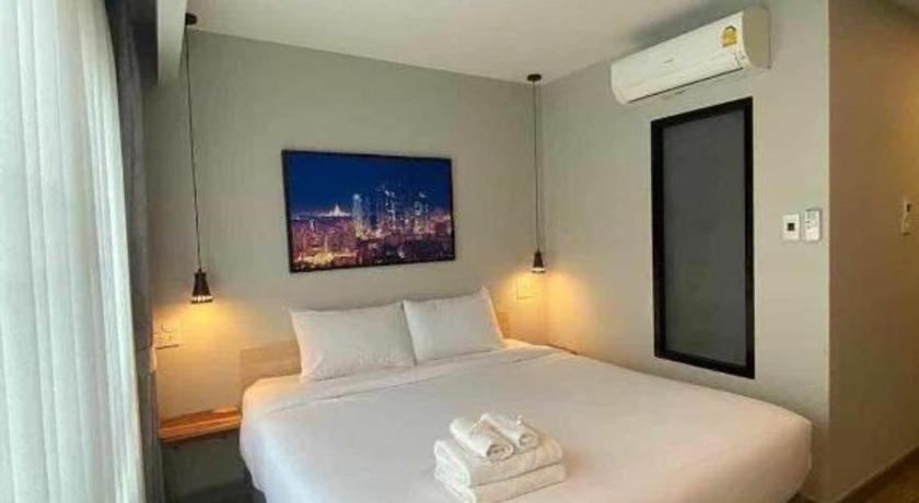 Ένα ή περισσότερα κρεβάτια σε δωμάτιο στο Tanban Mansion