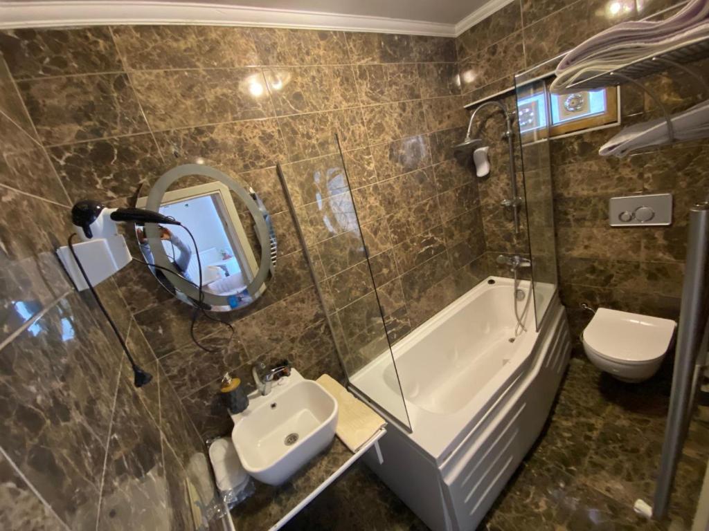 Koupelna v ubytování EVİM APART HOTEL