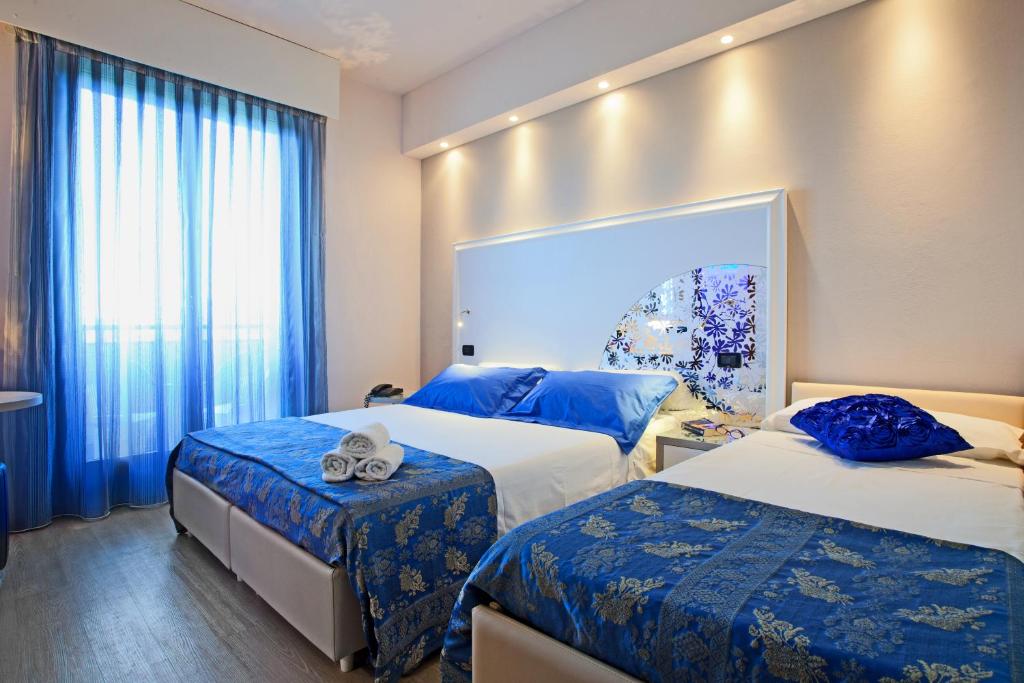 Postel nebo postele na pokoji v ubytování Hotel Krone