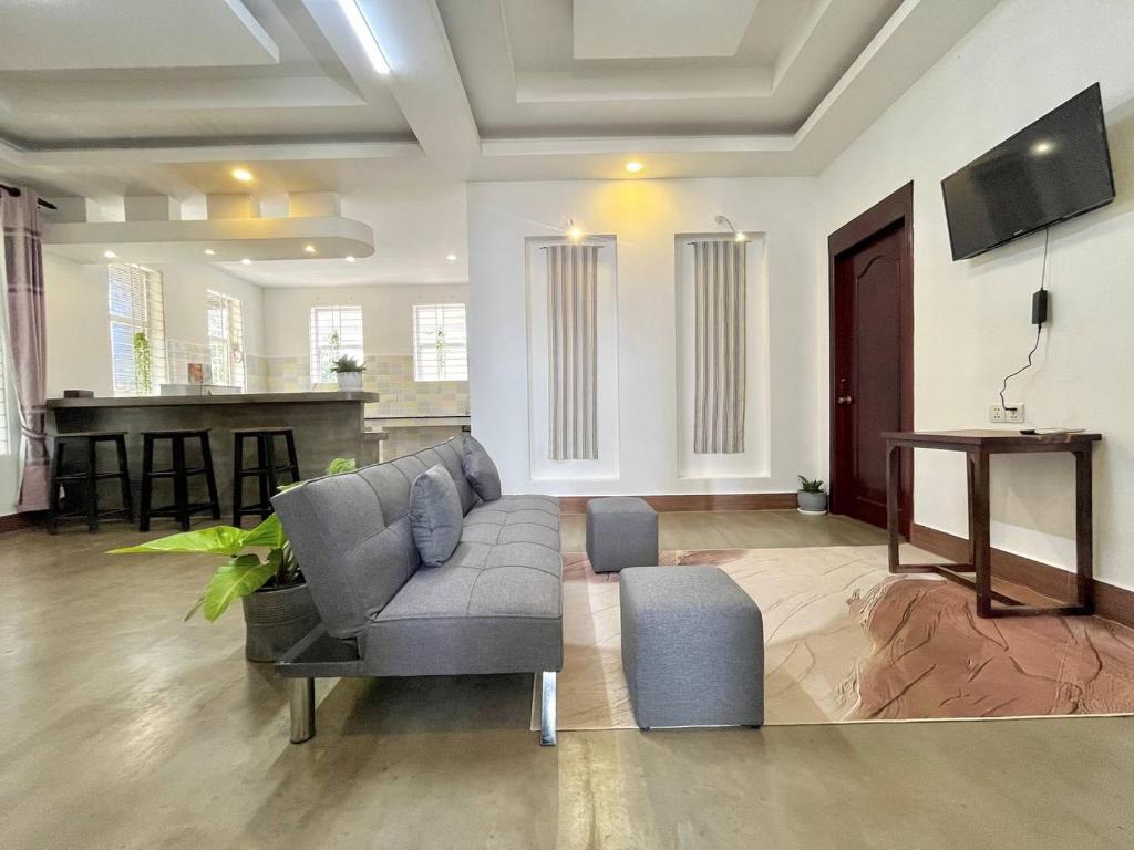 TV a/nebo společenská místnost v ubytování Canopy Residence