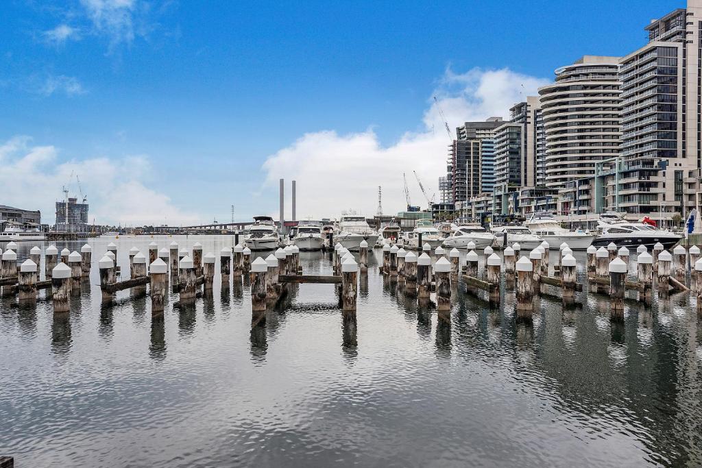 a marina with lots of boats in the water at Docklands Private Collection - NEWQUAY in Melbourne