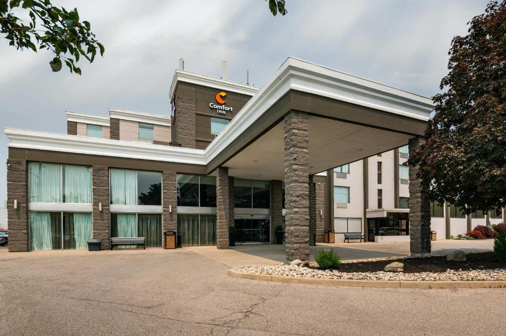 a building with a sign on the front of it at Comfort Inn & Conference Centre Toronto Airport in Toronto