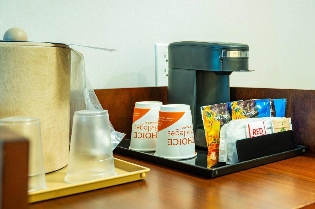 a tray with food and a coffee maker on a table at Comfort Inn & Conference Centre Toronto Airport in Toronto