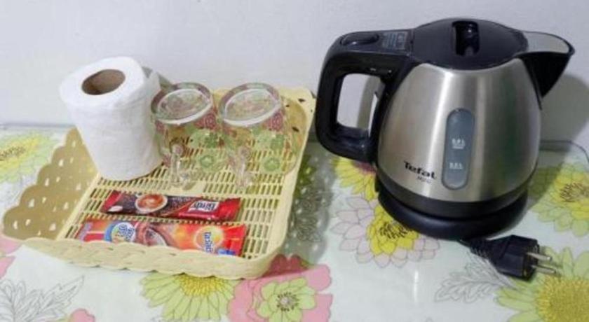 Chic Hotel Suratthaniにあるコーヒーまたはお茶