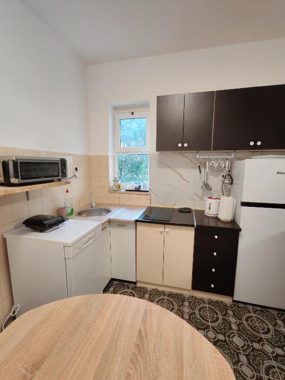 Kuchyňa alebo kuchynka v ubytovaní Apartment Oscar