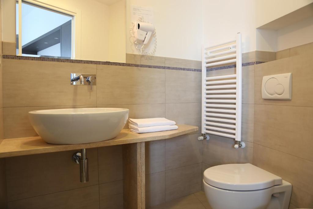 Koupelna v ubytování Hotel Beatrice