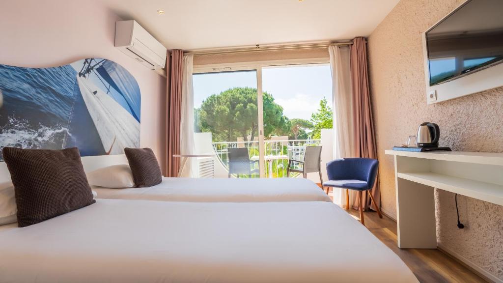 Кровать или кровати в номере Hotel Europe