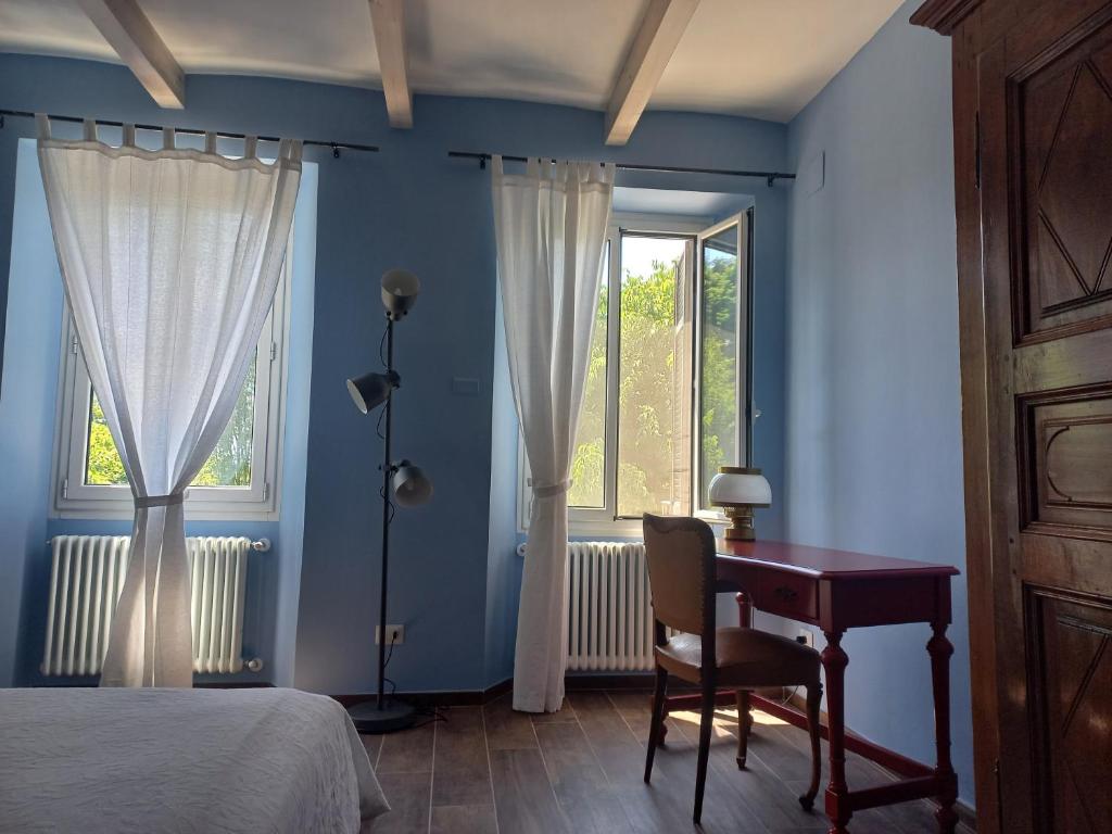 Posteľ alebo postele v izbe v ubytovaní B&B Tenuta Montegrande