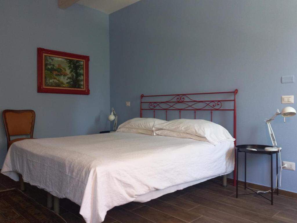 Posteľ alebo postele v izbe v ubytovaní B&B Tenuta Montegrande