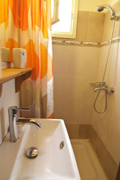 Koupelna v ubytování Mango Rooms