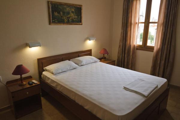 Postel nebo postele na pokoji v ubytování Mango Rooms