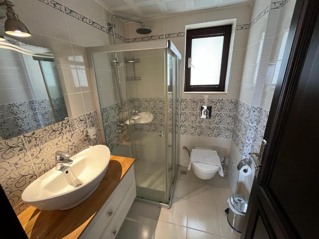 Koupelna v ubytování Derya Beach Apartment