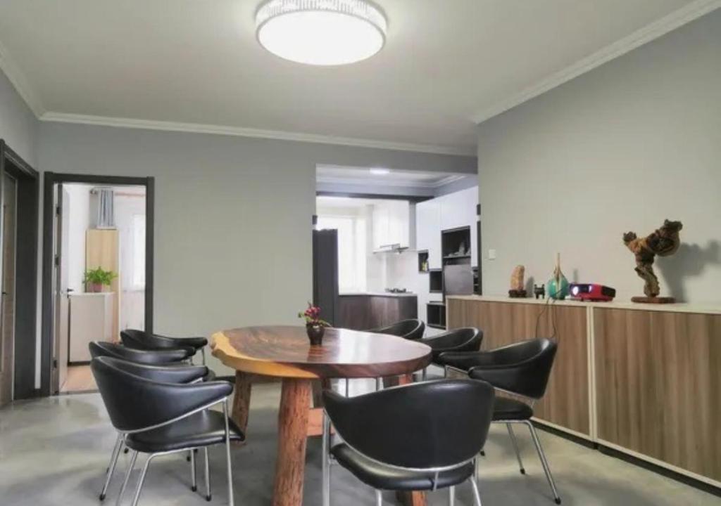 TV a/nebo společenská místnost v ubytování Boxianyuan Three-Bedroom Apartment