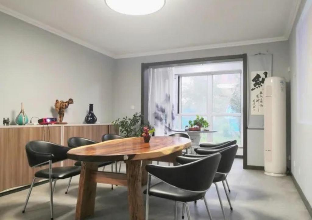Fotografie z fotogalerie ubytování Boxianyuan Three-Bedroom Apartment v destinaci Čchin-chuang-tao